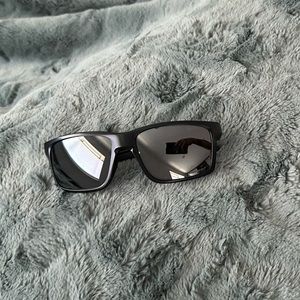 Oakley main link sunglasses. Black frame and black prizm lenses.